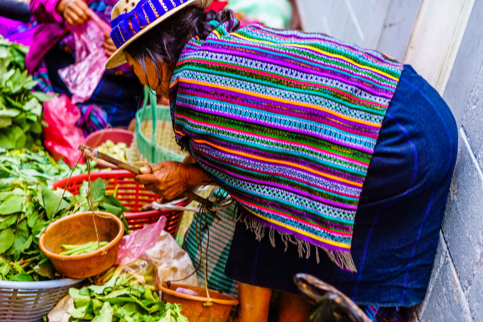 Marchande maya de légumes au marché de Chichicastenango, Guatemala