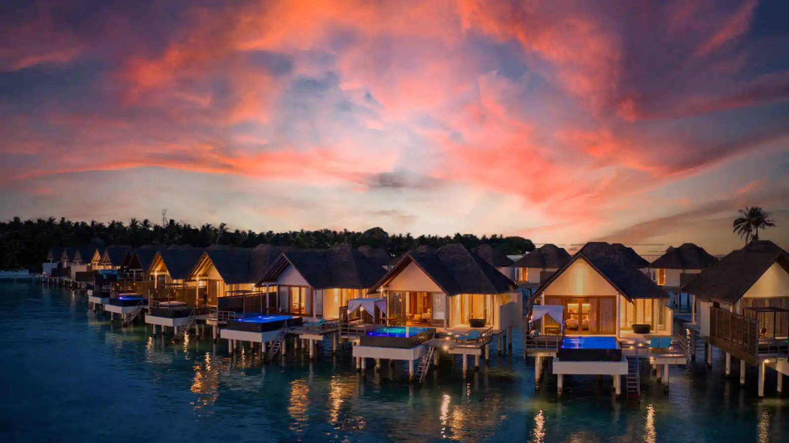 Villas & coucher de soleil, Furaveri Maldives, Maldives