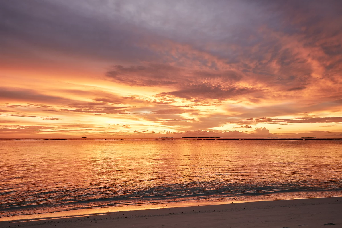 Coucher de soleil sur la plage de l'hôtel, Sun Siyam Iru Fushi