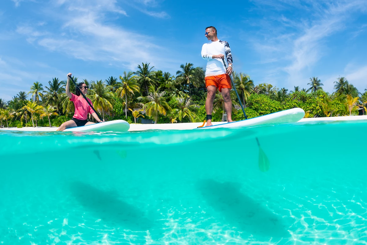 Stand-up paddle, Outrigger Maldives Maafushivaru Resort, Maldives